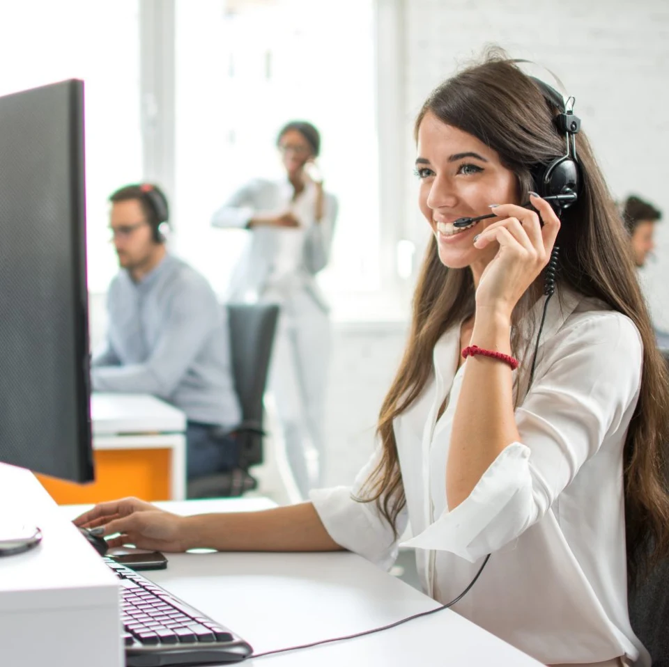 Support adviser speaking with a customer using a headset